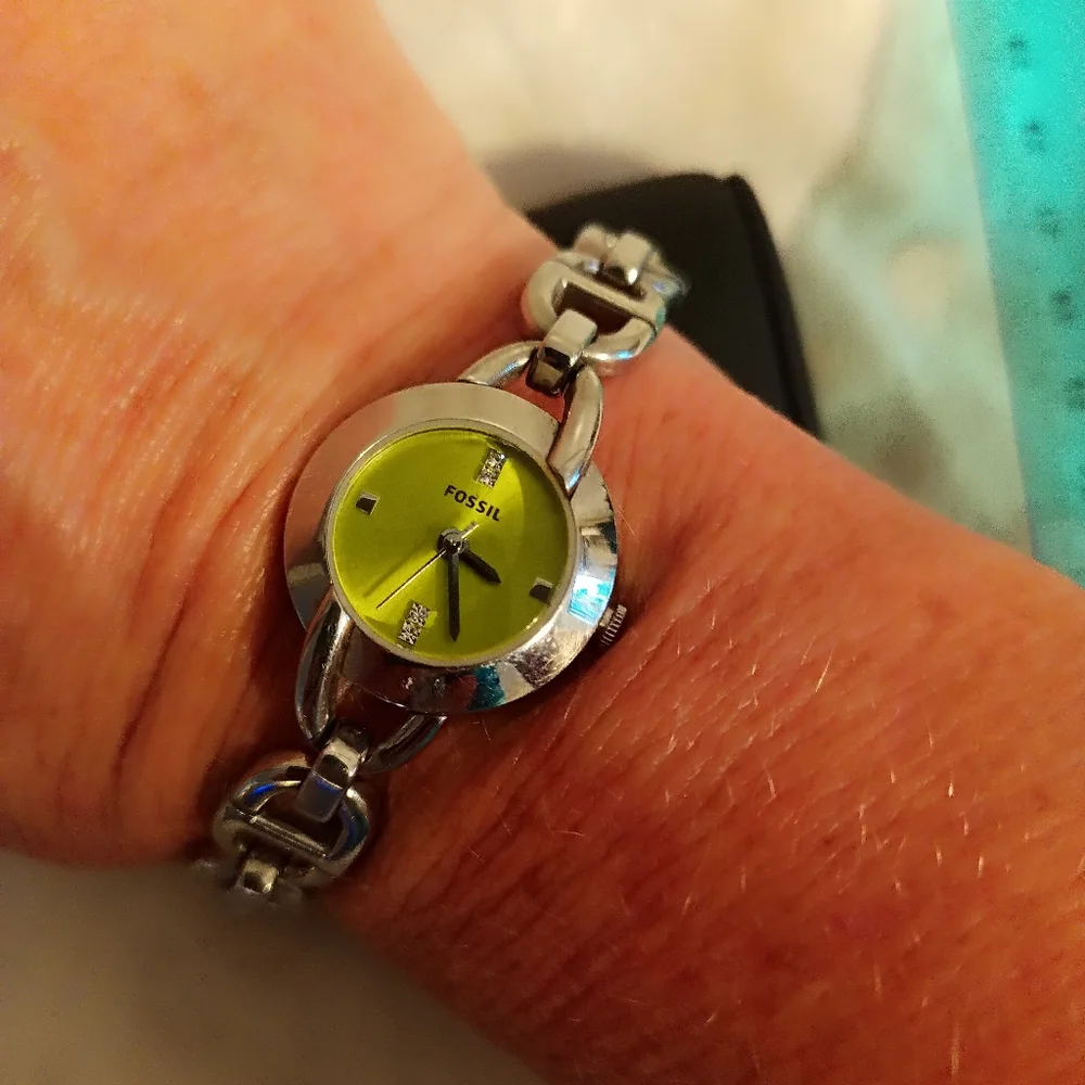 Fossil silver tone bracelet watch lime green rhinestone dial